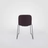 A purple chair with a black frame against a white background.