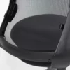 A black office chair with a mesh back.