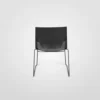 A black plastic chair against a white background.