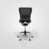 A black mesh office chair on a white background.