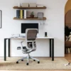 A home office with a white desk and Zody task chair.