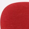 A close up of a red chair with a white background.