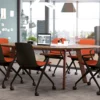 A meeting room with a table and Haworth Bowi chairs.