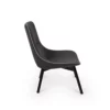 A modern black lounge chair against a white background.