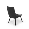 Modern black upholstered chair with angled legs isolated on a white background.