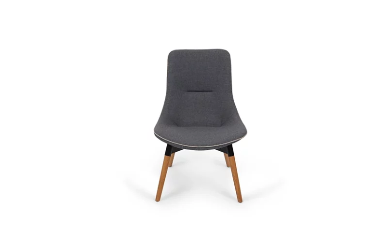 Modern gray upholstered chair with wooden legs isolated on a white background.