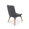 Modern gray upholstered chair with wooden legs on a white background.