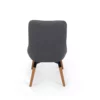 Modern gray upholstered chair with wooden legs isolated on a white background.