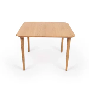 A simple wooden table with four legs on a white background.