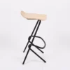 Modern bar stool with a black metal frame and a light wooden seat against a white background.