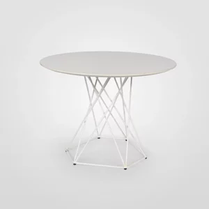 Round table with a white top and a geometric wire base against a gray background.