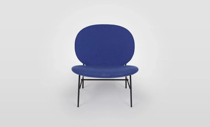 A blue modern chair against a white background.