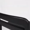 Black wooden chair against a white background.