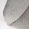 Close-up of a folded gray fabric with a textured surface.