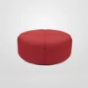 Red circular sectional ottoman on a white background.